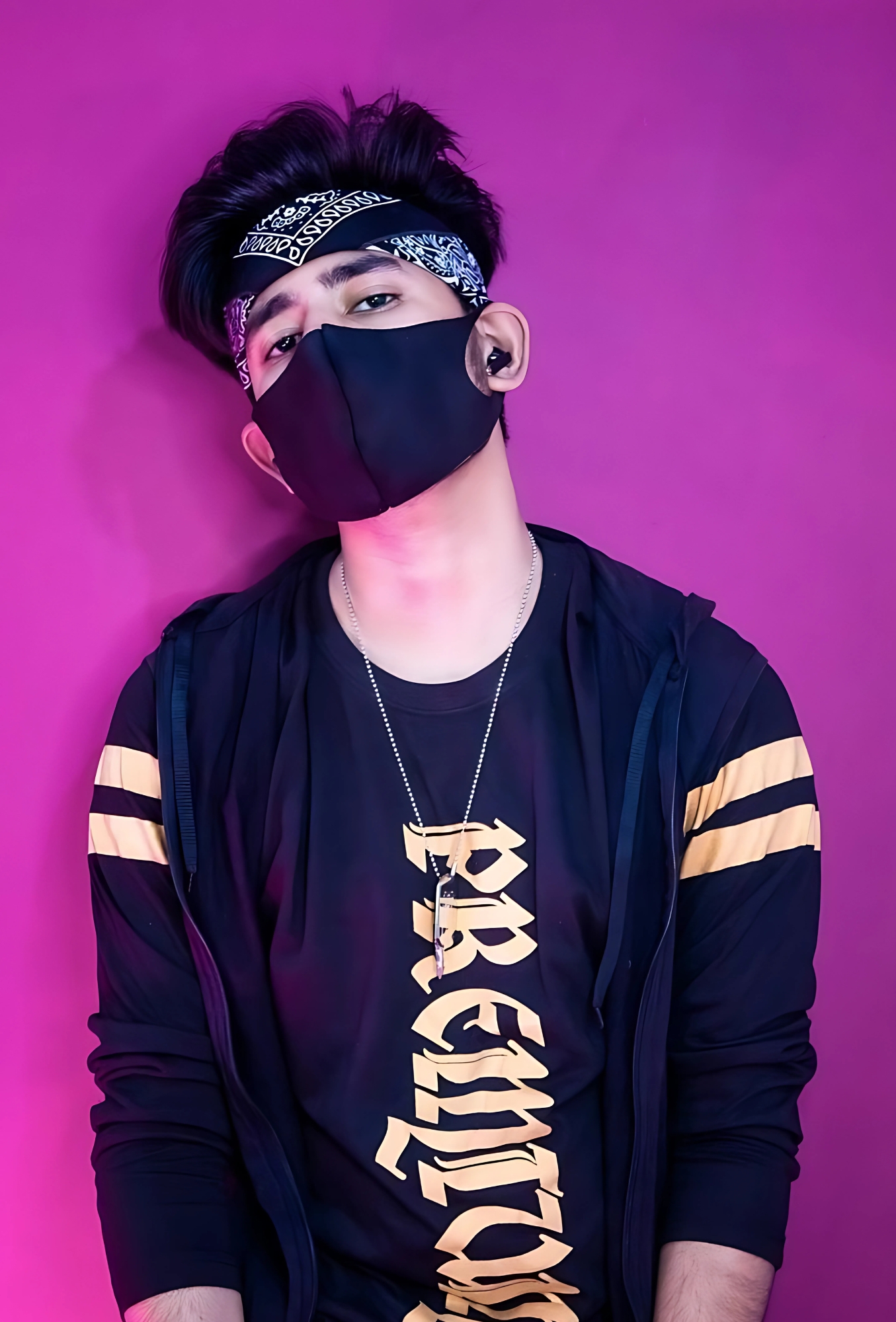 Attitude boy wearing black mask and headband, stylish Instagram DP with bold look