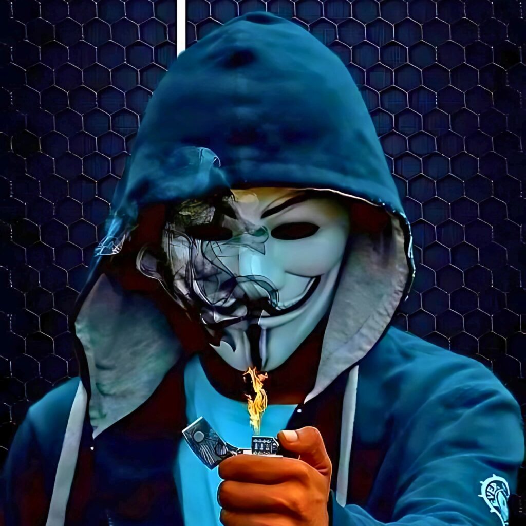 Boy in hoodie wearing a Guy Fawkes mask, holding a lighter with flames, representing a bold and mysterious attitude – perfect for WhatsApp DP.