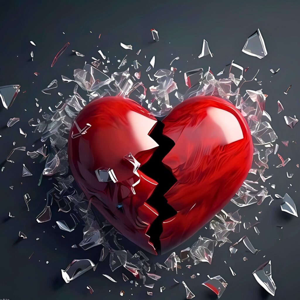 Shattered red heart exploding into glass pieces on a dark background – powerful and emotional broken heart DP for WhatsApp