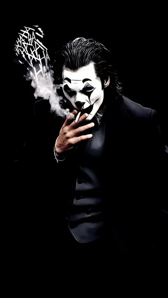 Black Joker 4K wallpaper – dark monochrome image of Joker in black suit, smoking with clown makeup and smoke forming "HA" text