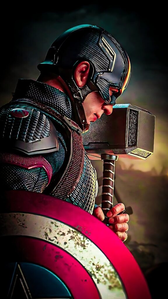 Captain America holding Mjölnir and his shield in a dramatic pose during Avengers Endgame, HD 4K vertical wallpaper.