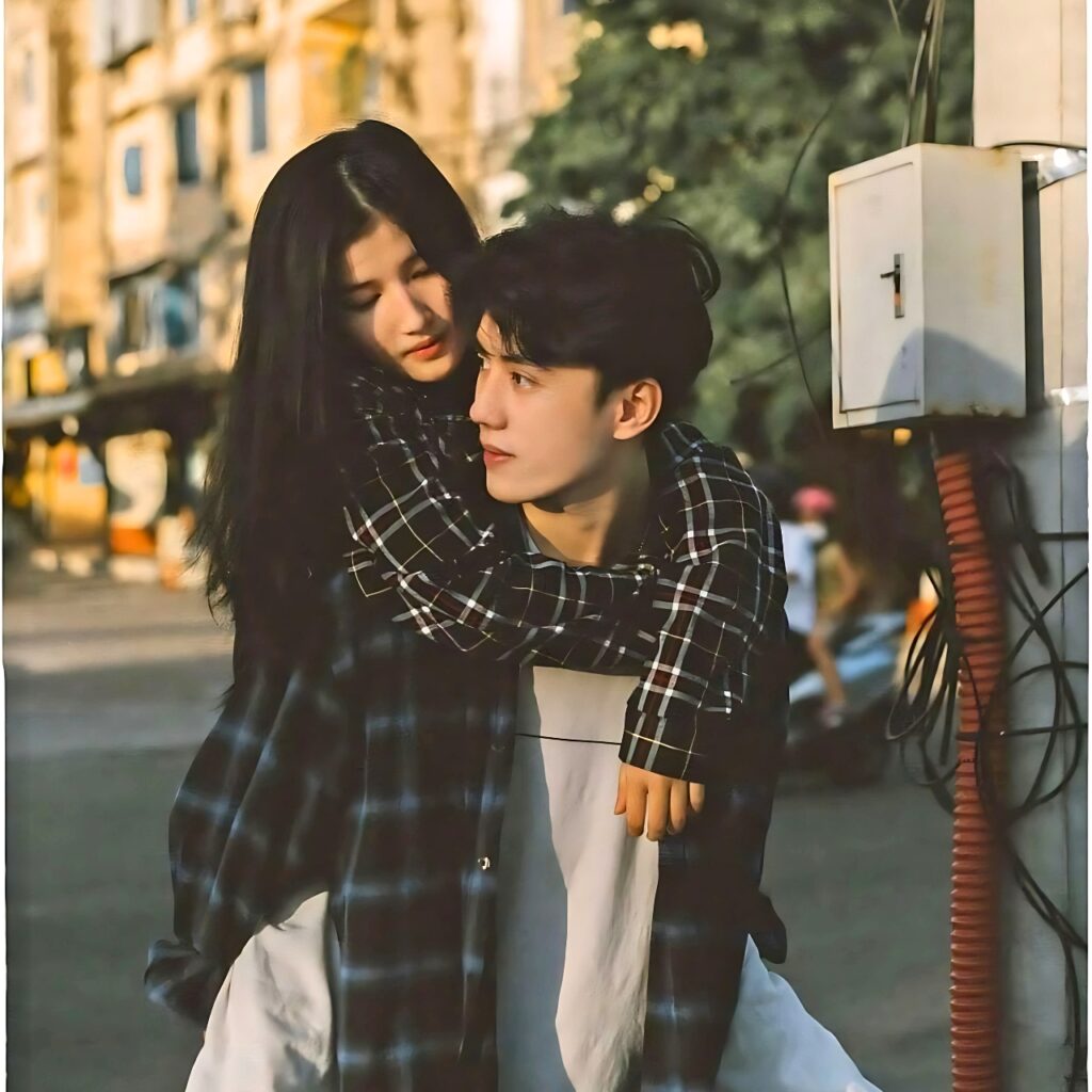 Chinese or Korean cute couple sharing a romantic and cozy moment in street style fashion – perfect image for WhatsApp couple DP