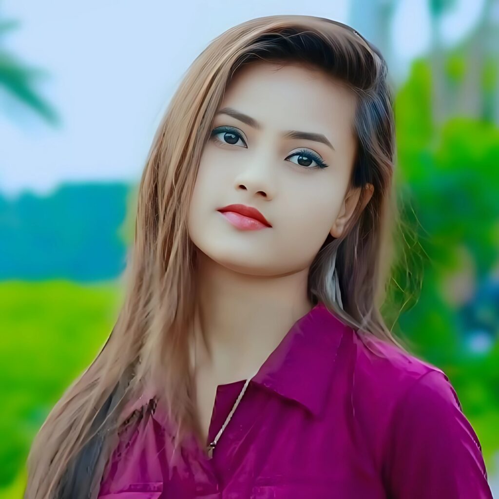 Cute ladki ki DP in maroon top with natural outdoor background and soft makeup