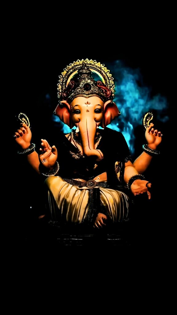 Divine HD phone wallpaper of Ganpati Bappa (Ganesha) showcasing intricate details and vibrant colors with a majestic, spiritual aura