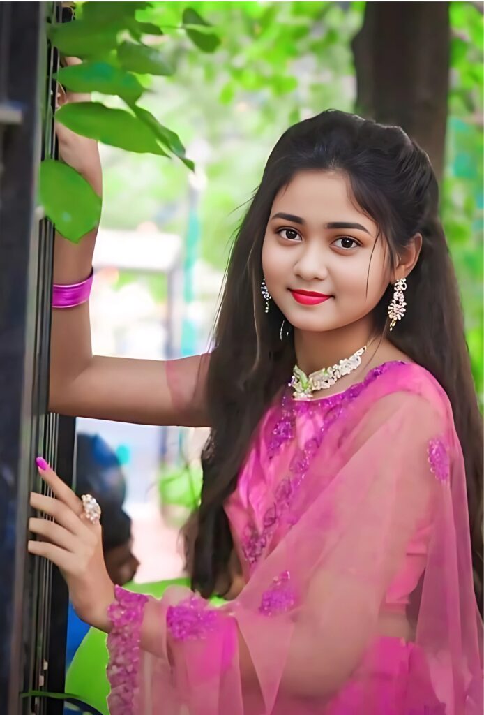 Beautiful real girl profile pic in pink traditional dress with natural background