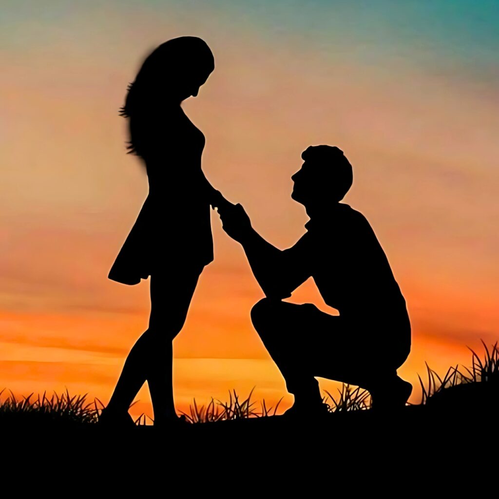 Silhouette of a couple during a romantic proposal at sunset — high-definition couple DP for WhatsApp full of love and emotion.