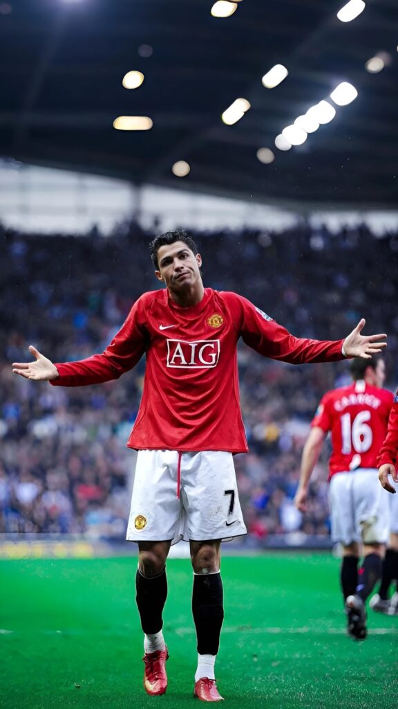 Cristiano Ronaldo in Manchester United kit with iconic shrug celebration pose – 4K football wallpaper.