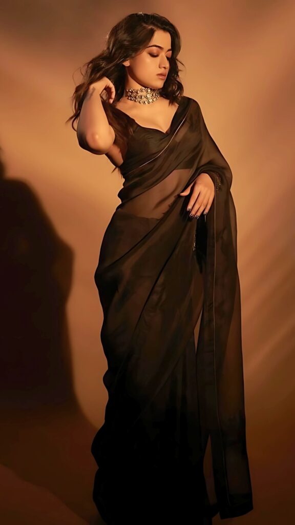 Telugu actress in elegant black saree posing gracefully – HD phone wallpaper.