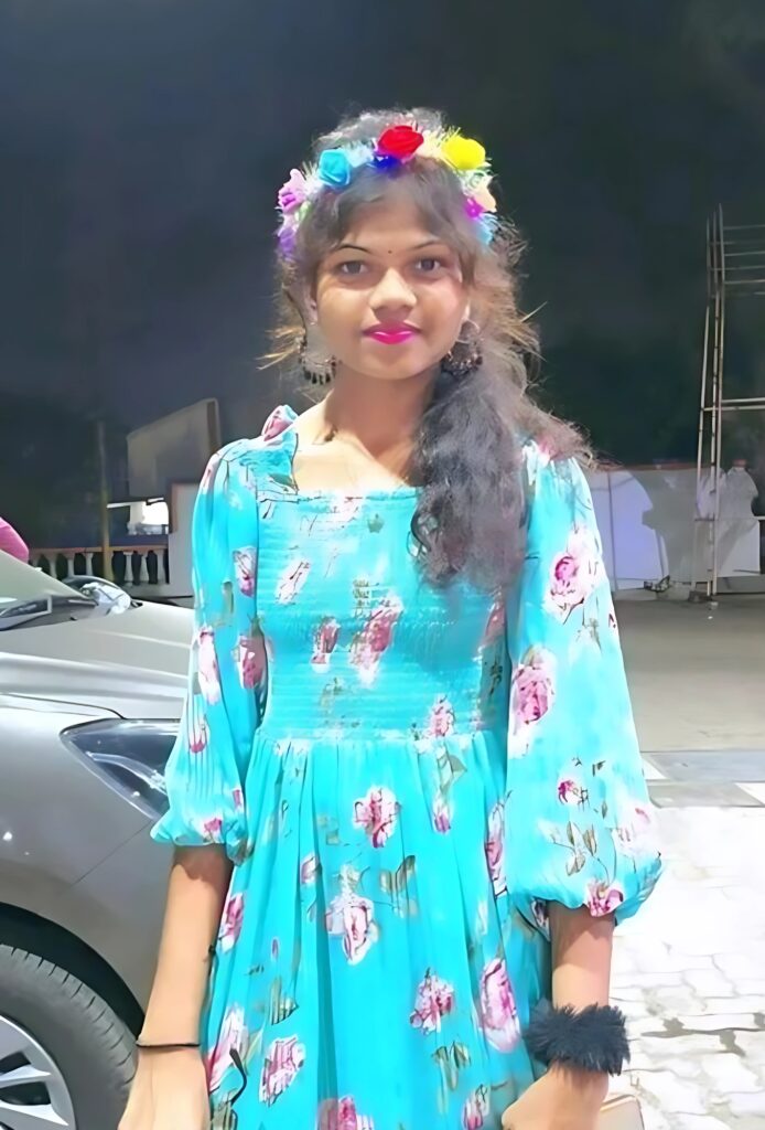 Girl wearing a floral blue dress with flower crown – stylish outdoor photo for WhatsApp DP
