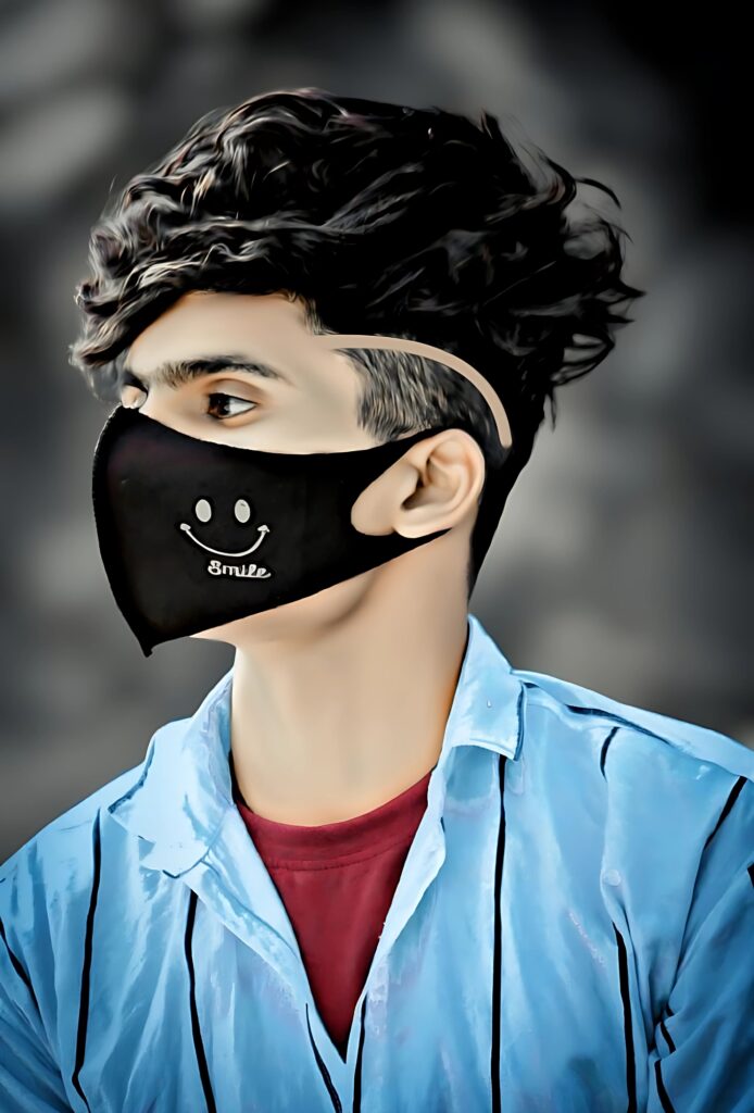 Stylish boy wearing black smiley face mask and blue shirt – modern Indian boy DP for social media