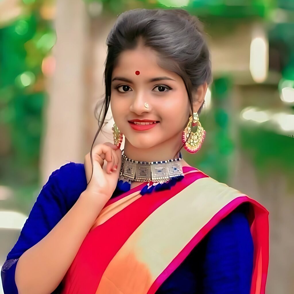 Cute girl traditional style DP in red and blue saree with jewelry – perfect for WhatsApp profile