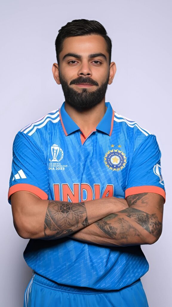 Virat Kohli posing confidently in India's 2023 World Cup jersey – HD 4K portrait wallpaper download