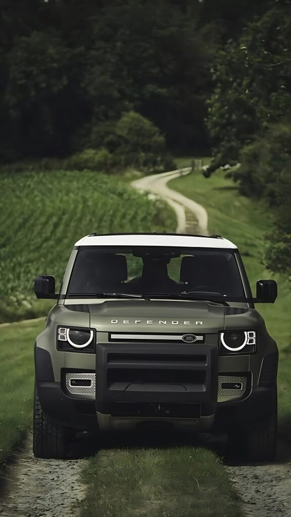 Front view of 2020 Land Rover Defender in green on rural trail – HD off-road wallpaper