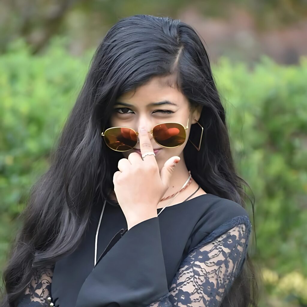 Stylish girl winking in sunglasses wearing black lace dress – attitude pose for WhatsApp DP