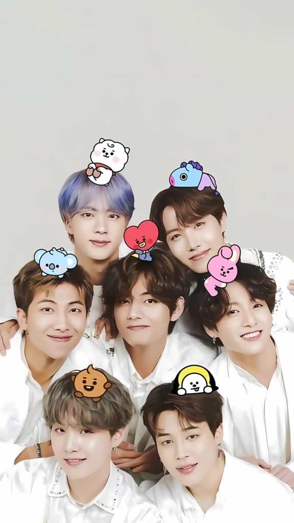 Cute BTS wallpaper featuring all 7 members wearing BT21 character headbands in a soft white outfit photoshoot