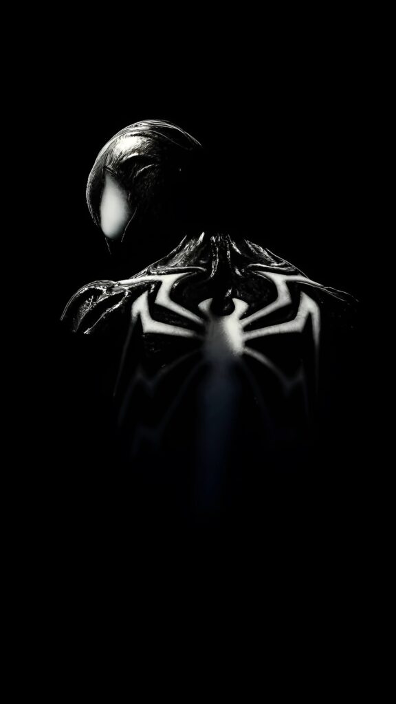 Dark 4K wallpaper of black Spider-Man in symbiote suit with glowing white spider emblem on his back