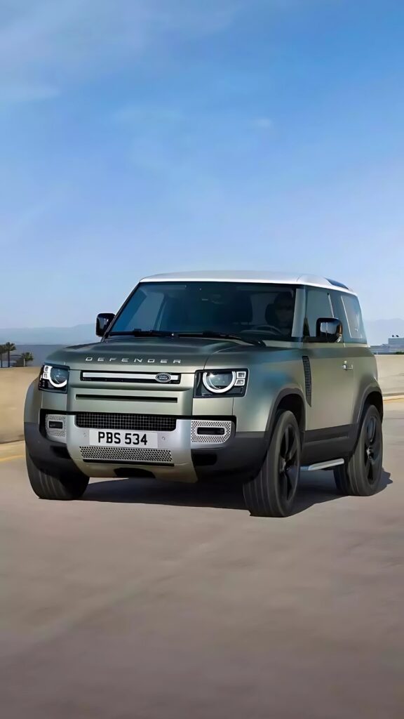 Land Rover Defender 110 driving on highway with clear blue sky – HD wallpaper