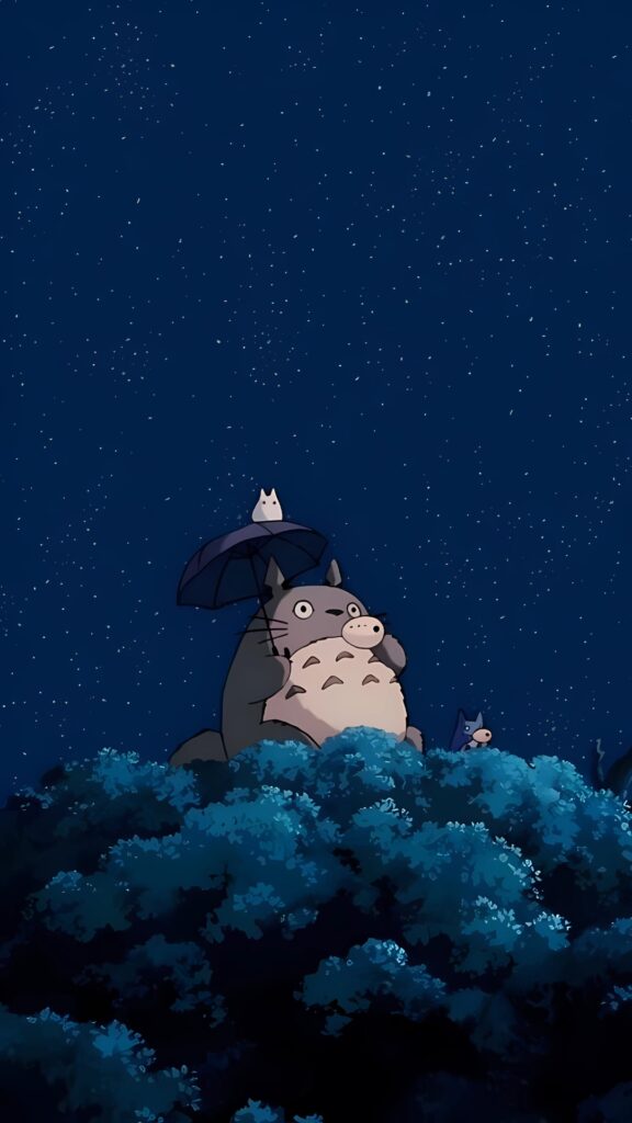 Totoro sitting peacefully under a starry sky with smaller Totoros and an umbrella, surrounded by treetops at night